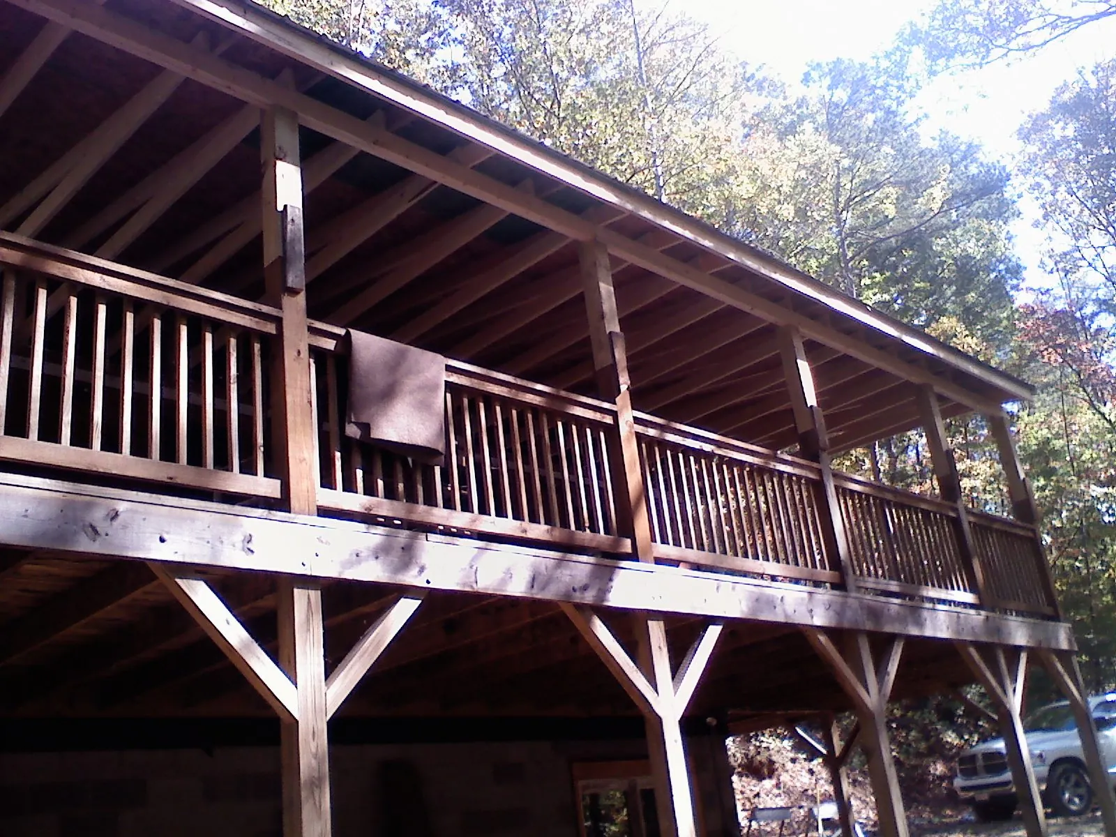 Timber framing under a new elevated porch and deck — Roof Leak Repair in Waukee by Roofing Brothers